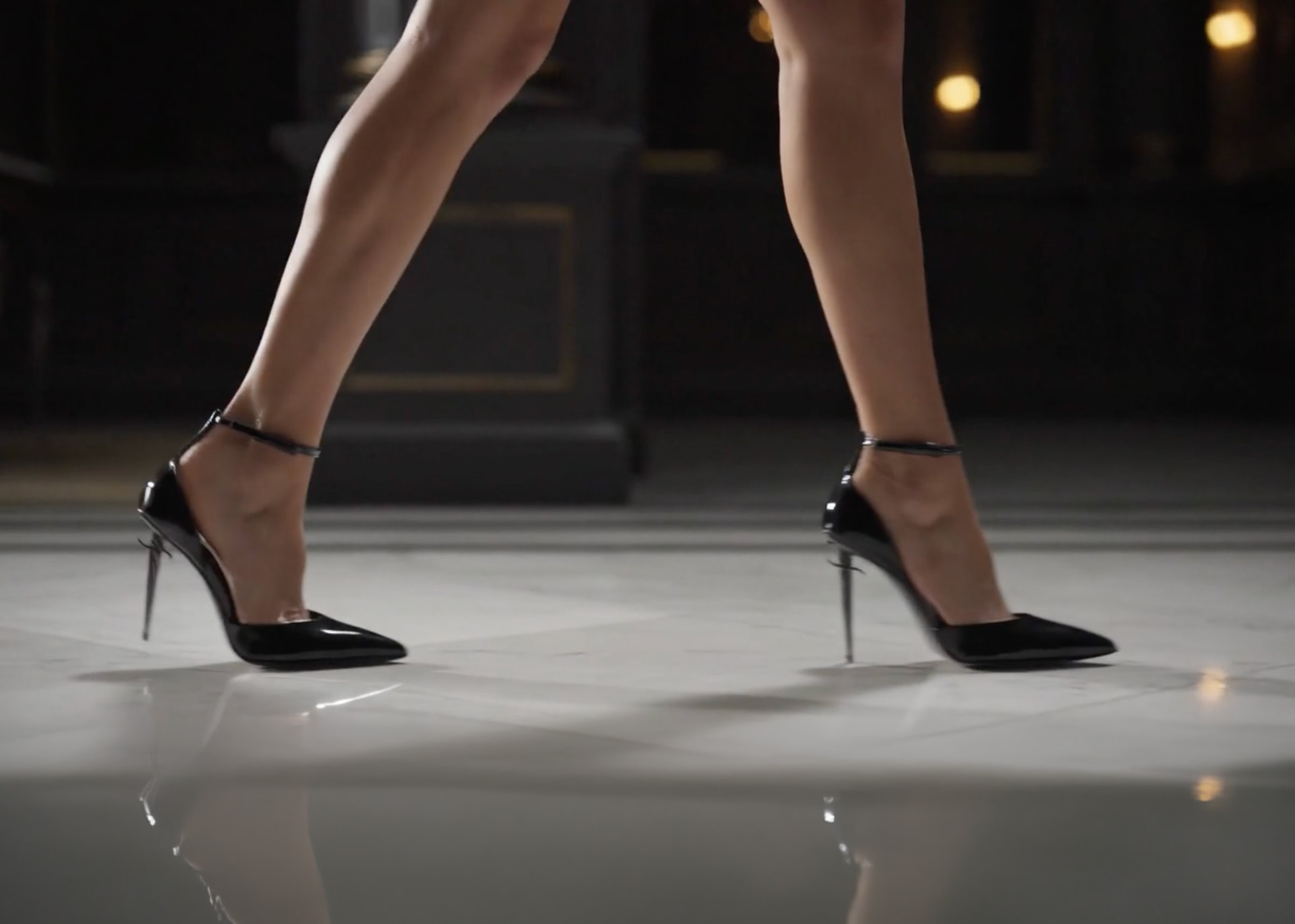 Model walking in La Franco Spada sword heels