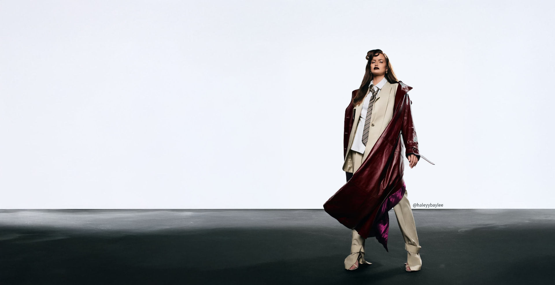 La Franco Spada campaign, model in a leather coat holding a blade